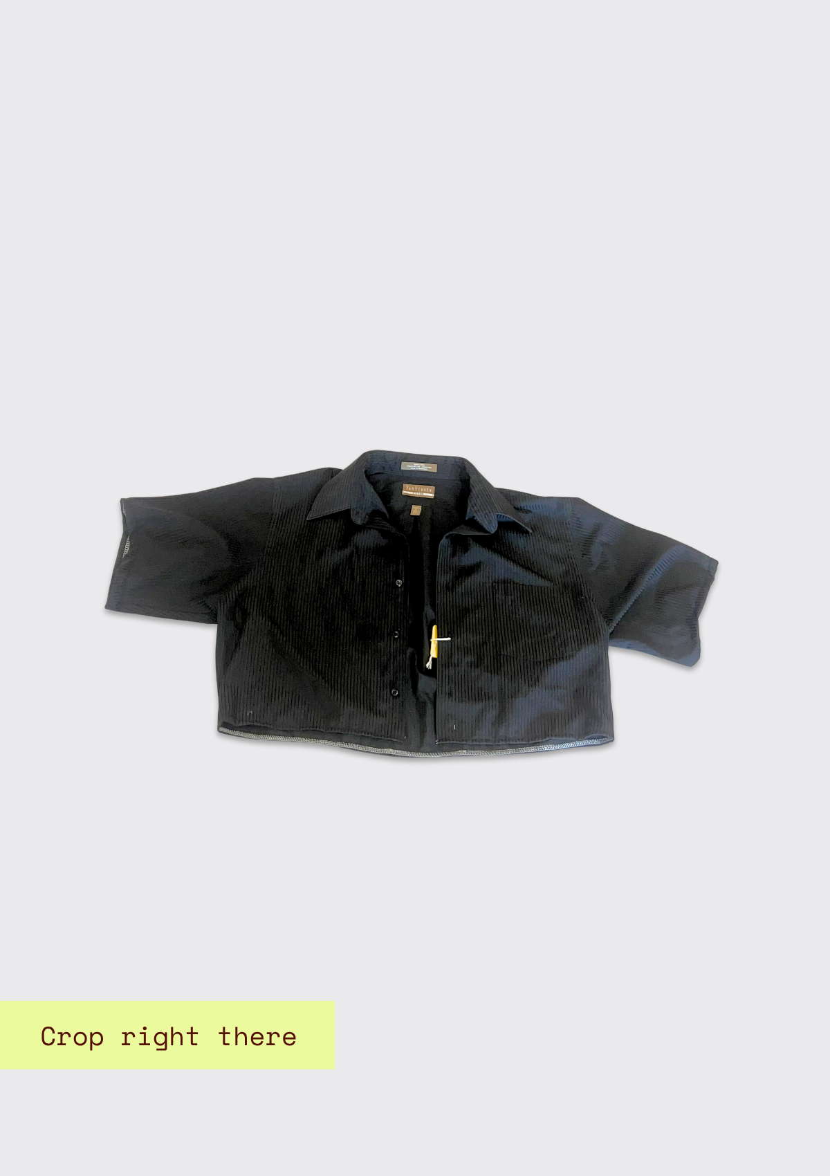 Black crop shirt upcycled from dress shirt on a light gray background with text 'Crop right there'.
