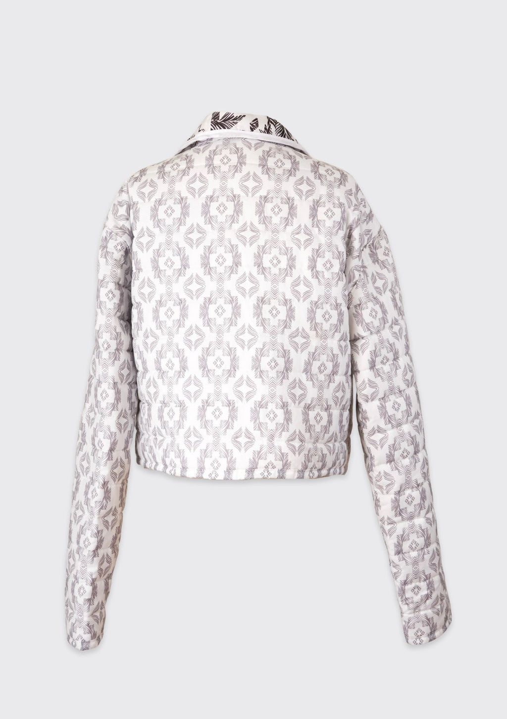 Upcycled from a comforter black and white patterned jacket on a light gray background