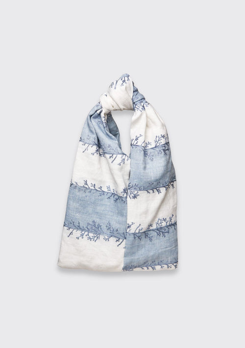 Blue and White coral patterned knot bag upcycled form designer deadstock fabric on a light gray background