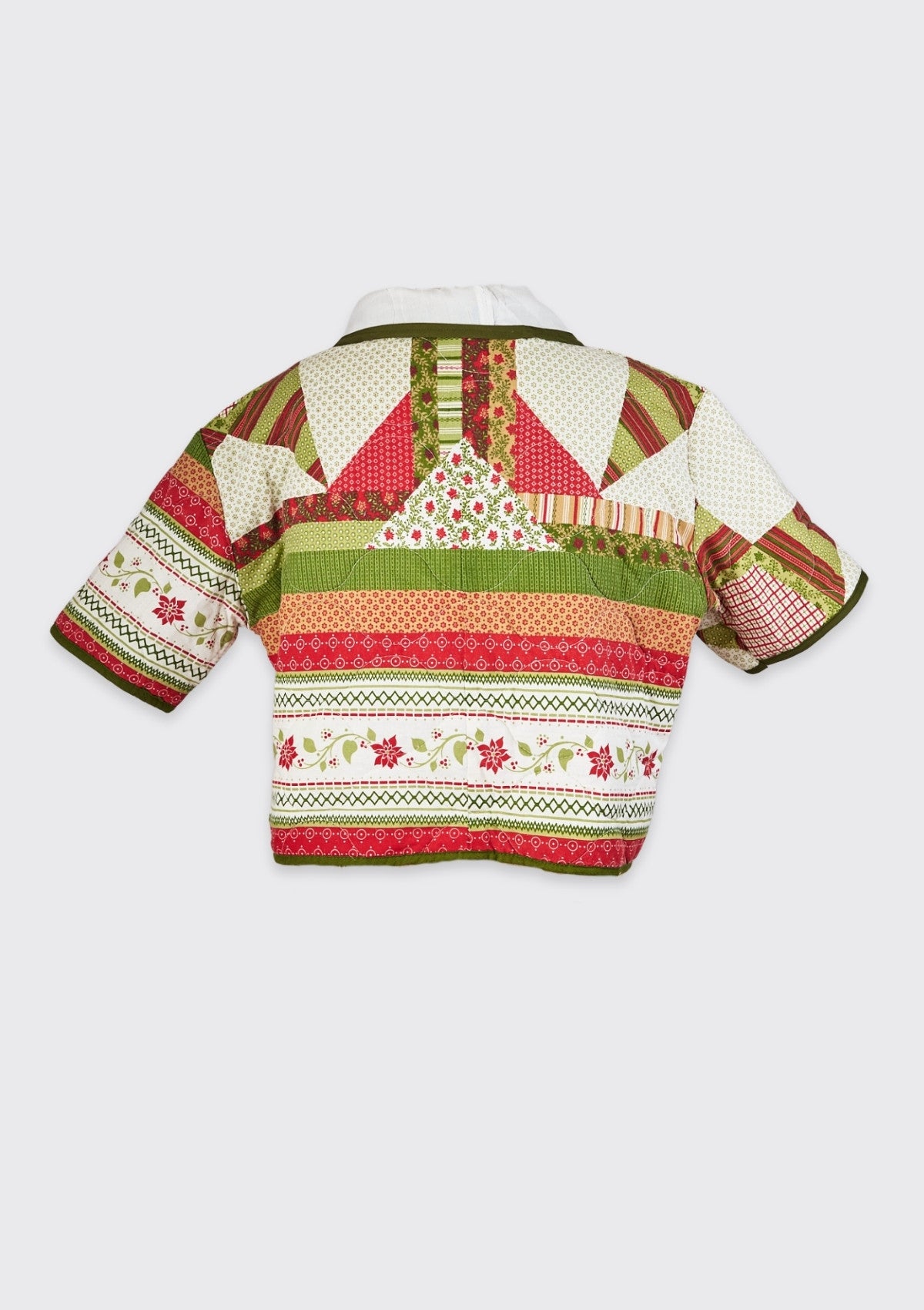 Colorful patterned jacket upcycled from a comforter on a white background