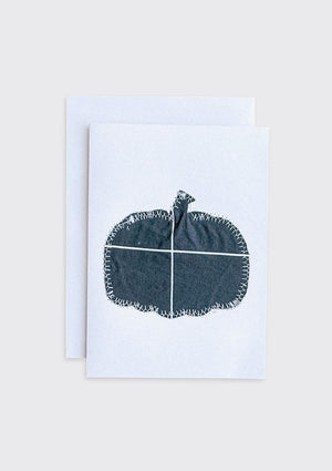 Greeting card with a black pumpkin design made from upcycled duvet cover on a white background