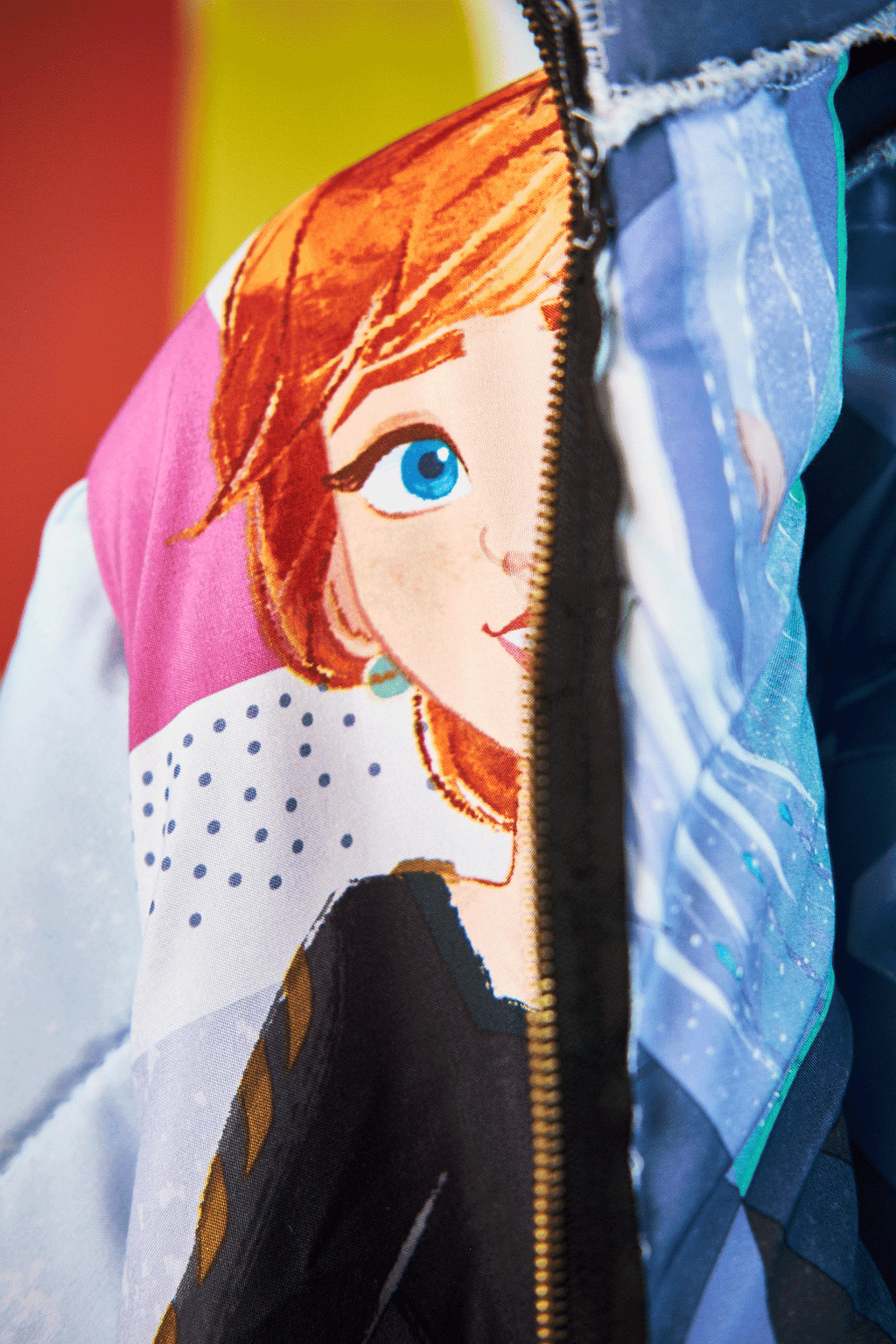 Close-up of Anna from Frozen theme jacket with a character design from upycled Frozen sleeping bag
