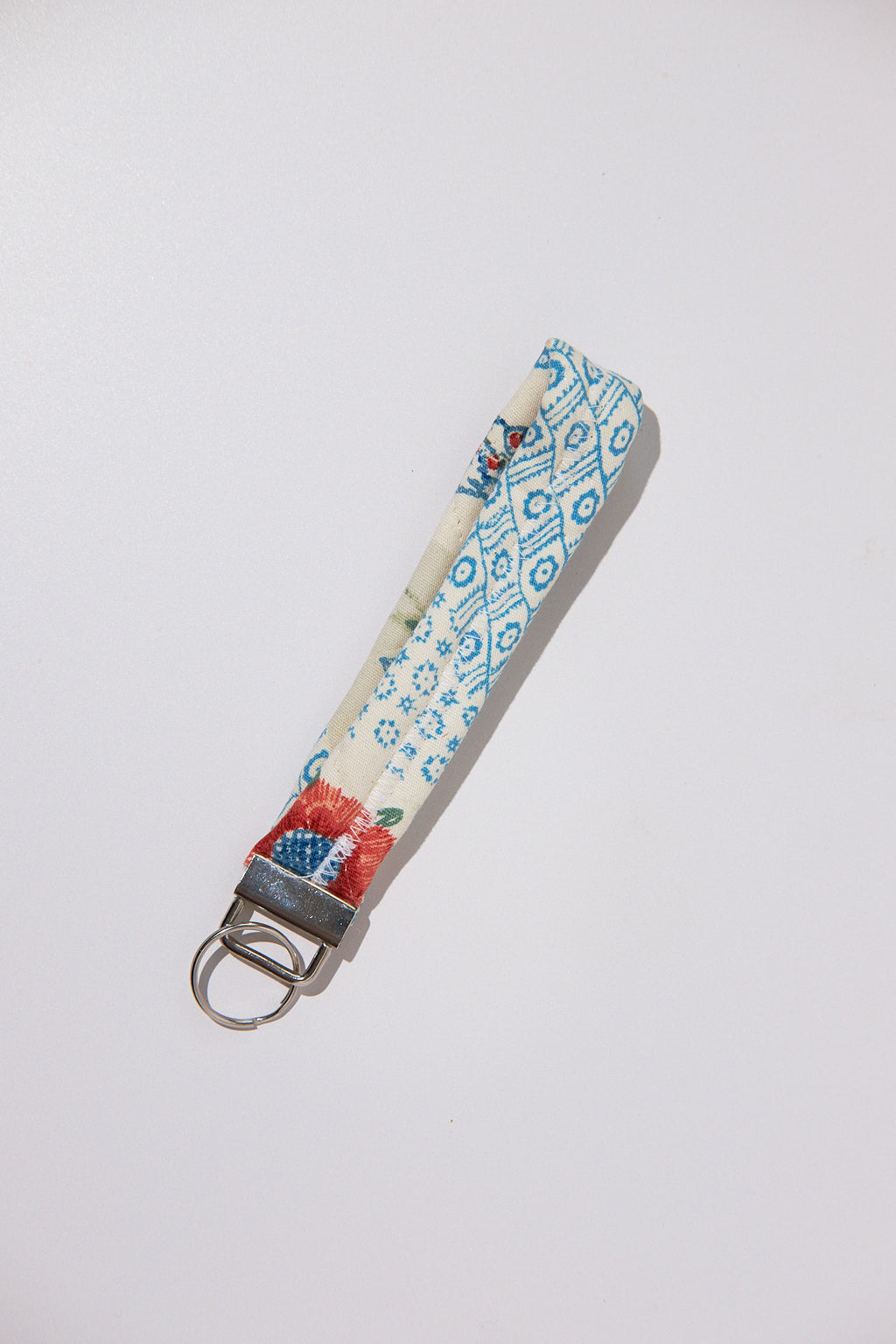 Floral patterned keychain strap on a white background