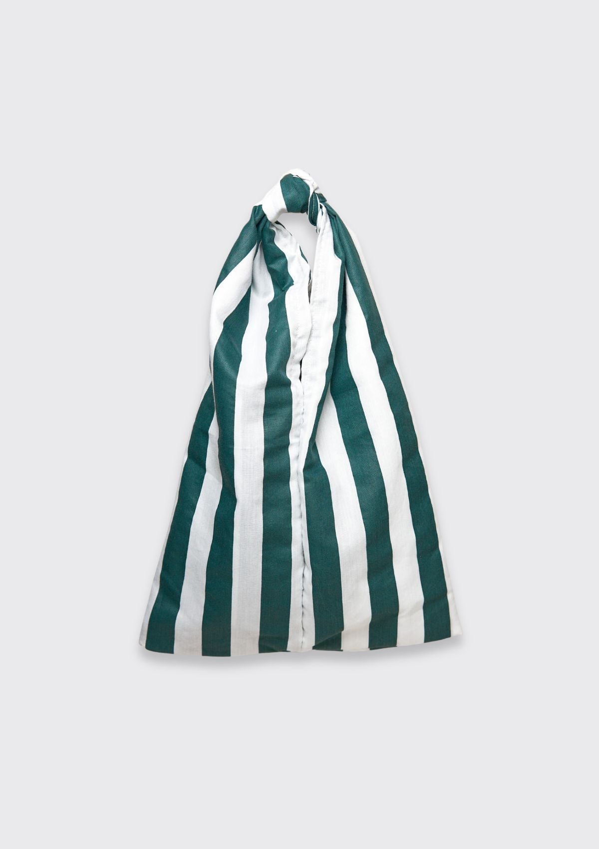Green and white striped knot bag upcycled form designer deadstock fabric on a light gray background
