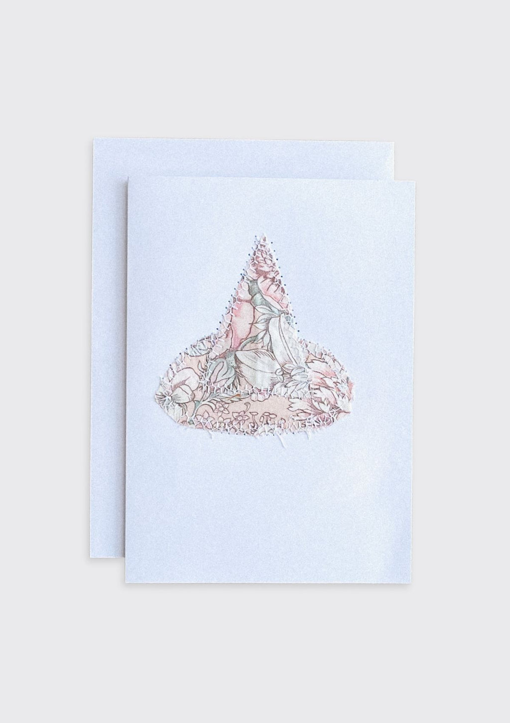 Greeting card with a floral witch hat design upcycled from quilt on a light cream background