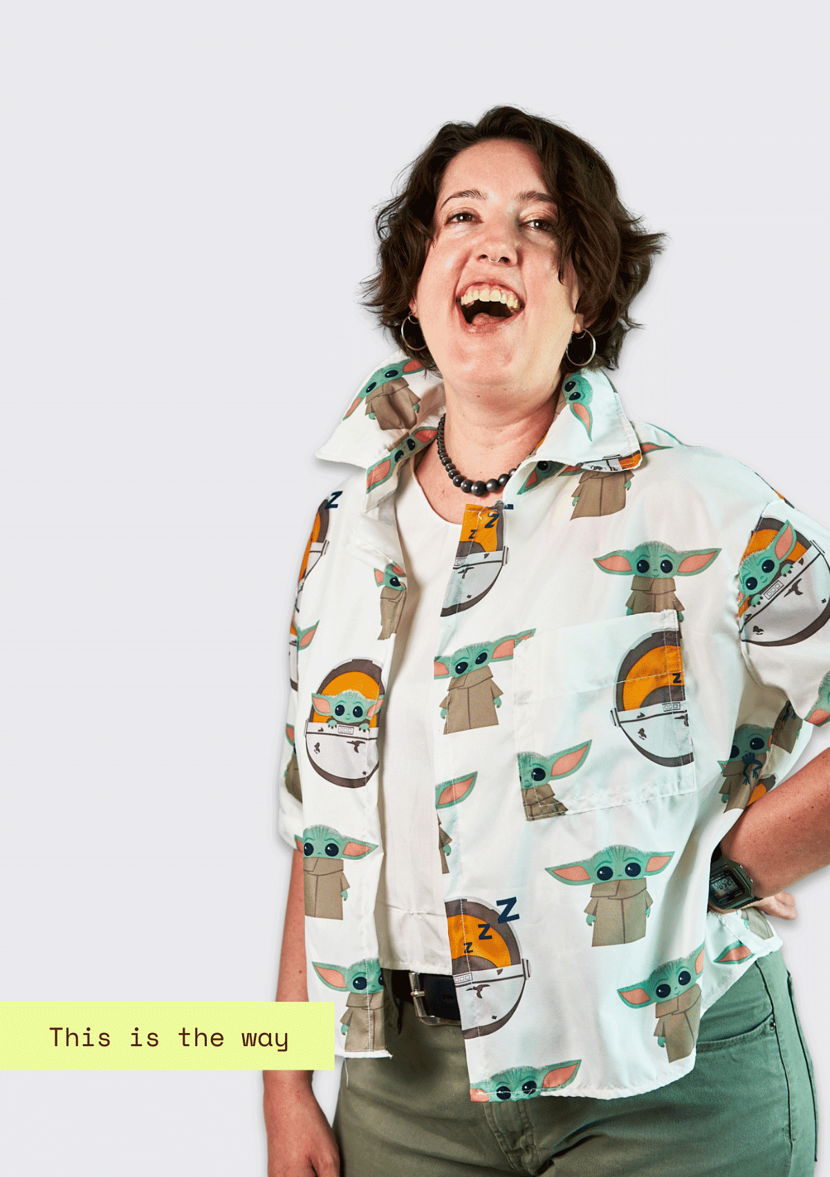 Person wearing an upcycled shirt with 'The Child' pattern and text 'This is the way' on a white background