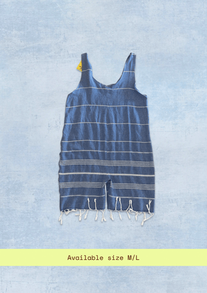 Blue striped romper/jumper with fringes upcycled from a turkish beach towel on a light blue background