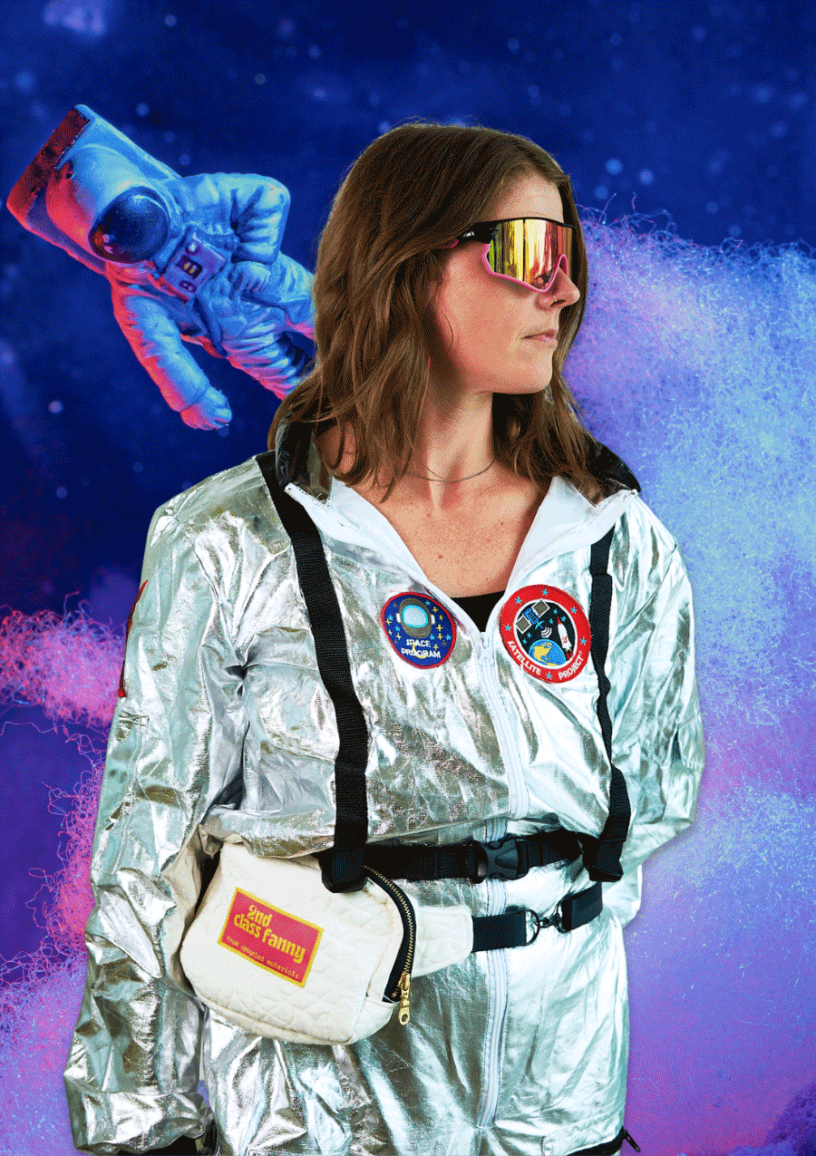 Person wearing a white fanny pack on waist in an astronaut suit with a space-themed background