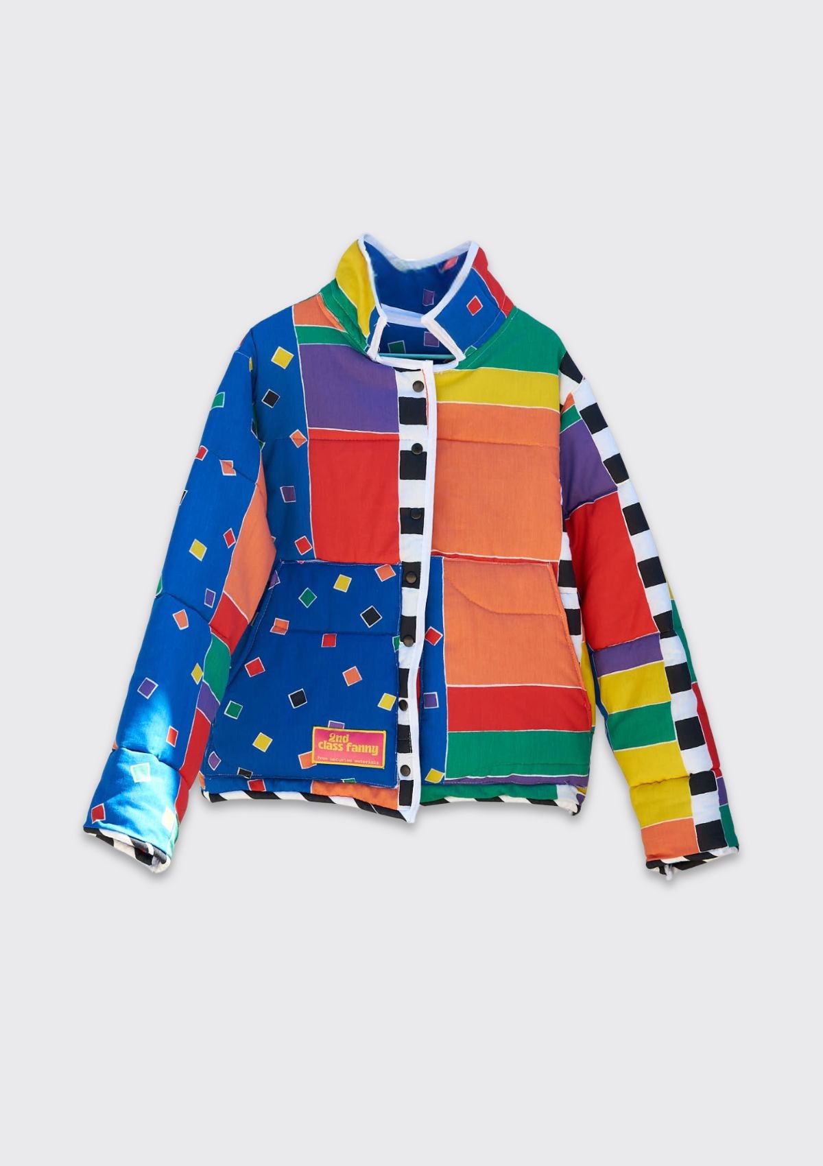 Colorful jacket with geometric pattern on a white background