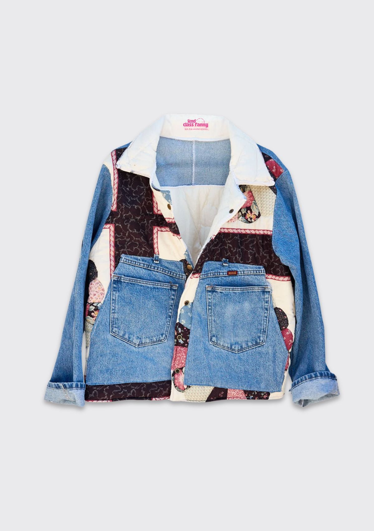 Denim jacket with patchwork design upcycled from jeans and a quilt on a white background.