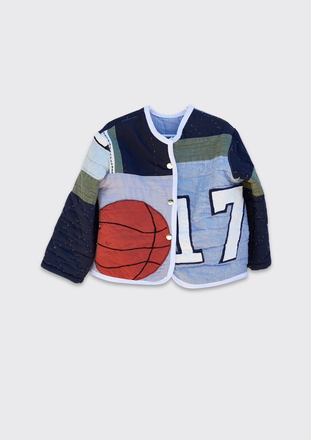 Children's jacket with basketball design and number 17 upcycled from a quilt on a light gray background