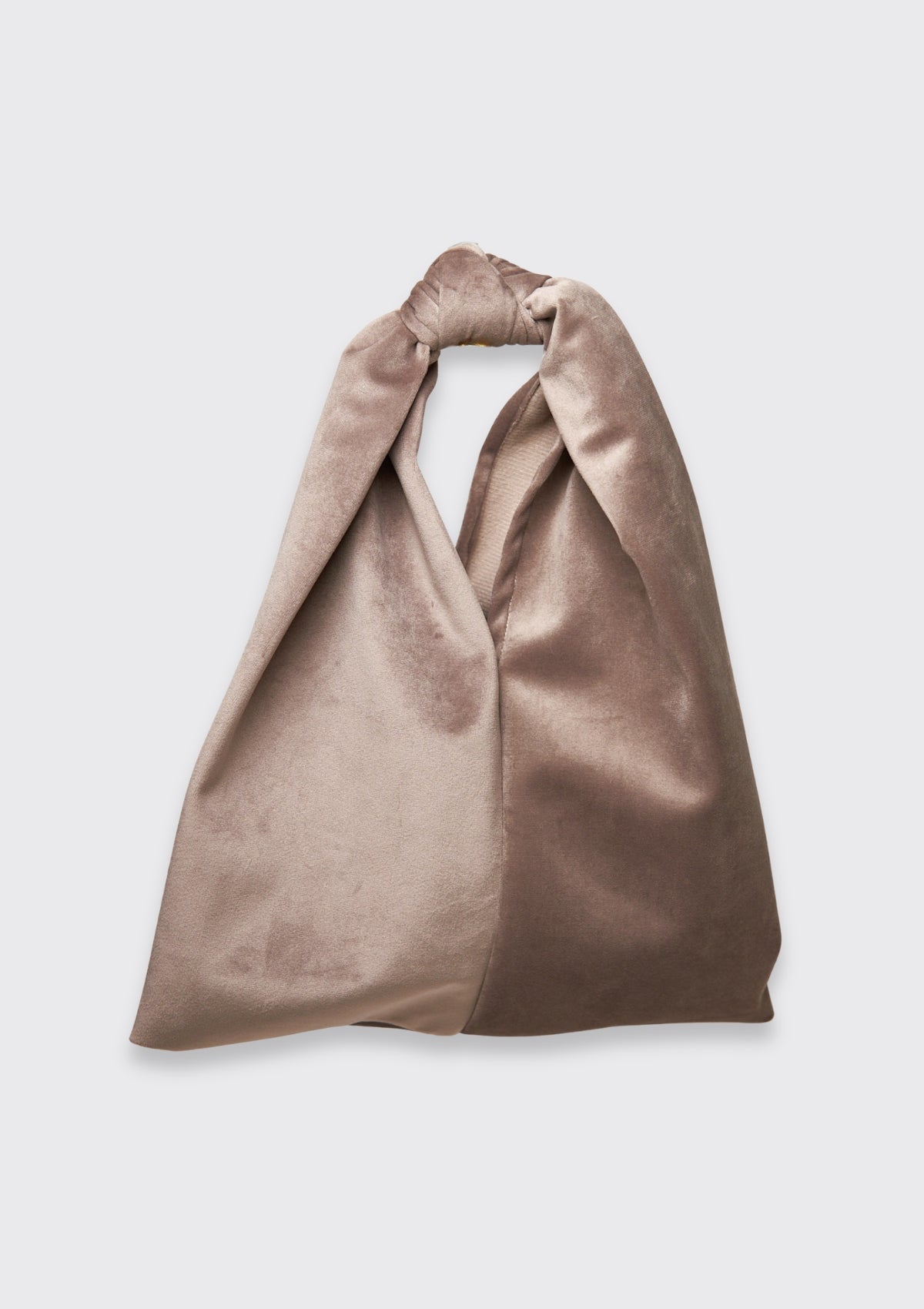 Brown velvet bag with a knot upcycled form designer deadstock fabric on a light gray background